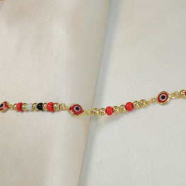 14k gold plated bracelet featuring evil eye beads, designed as a protection pulsera.