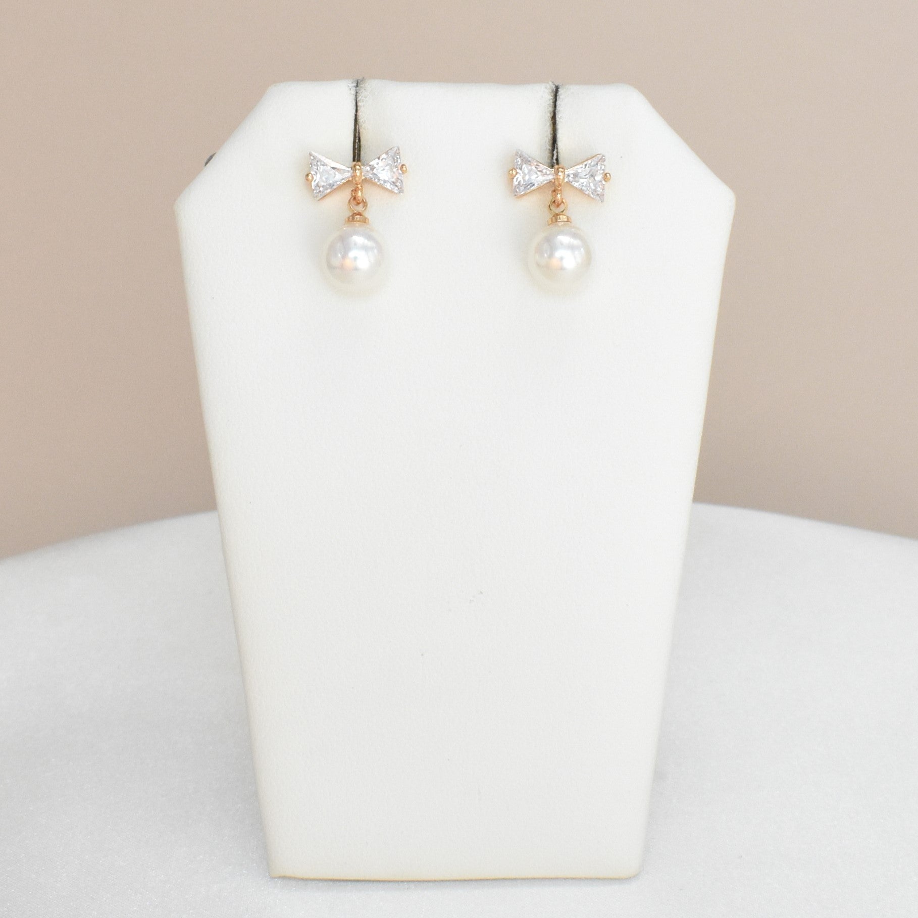 Dangly CZ Gold Plated Huggie Hoop Earrings with Pearl Drop, Bow/Ribbon Earrings